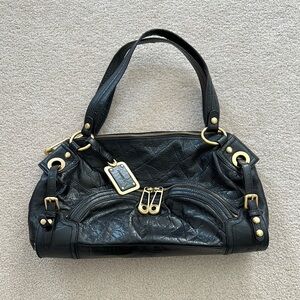 Black Leather Handbag with Gold Accents